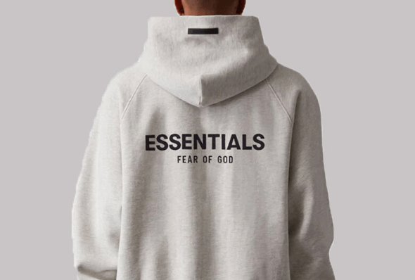 Deconstructing Temporal Identity Through Essentials Hoodie